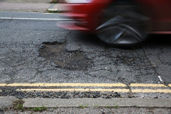 Potholes cost economy over £14bn a year