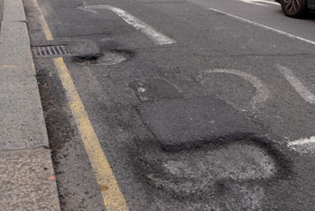 ‘Staggering’ two million vehicles damaged by potholes last year